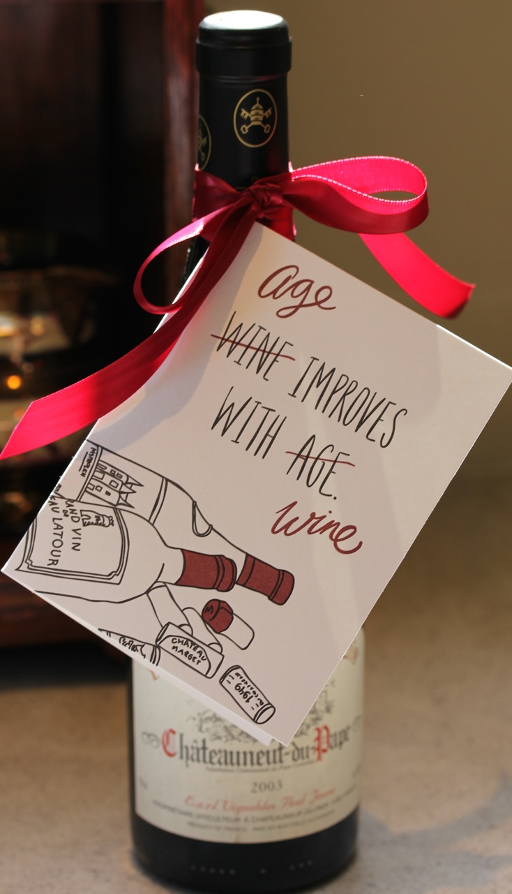 Wine bottle with red and white note