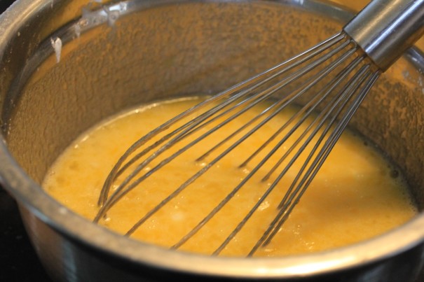 Cream of carrot soup with whisk